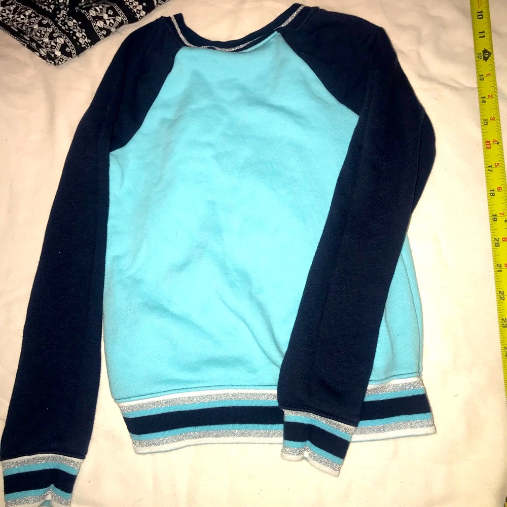 Athletic baby blue and dark blue sweater